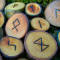 Corresponding rune sets crafted from trees native to northern Europe
